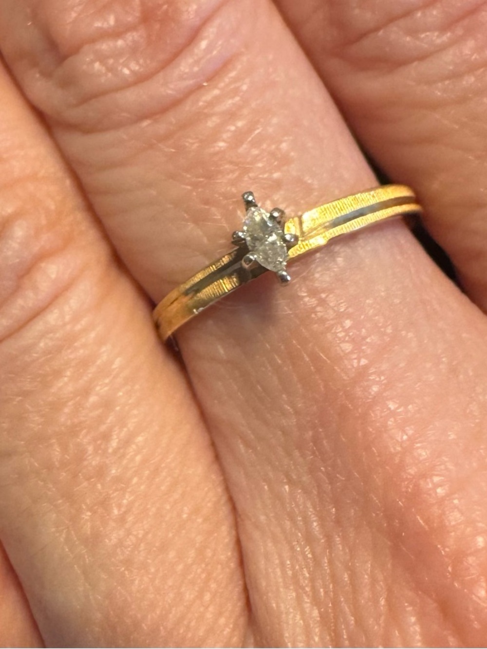 Vintage 10k Yellow Gold marquise-cut solitaire engagement ring.
